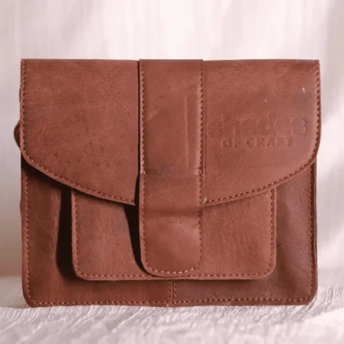 Brown leather sling bag