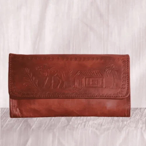 Rustic brown hand carved leather clutch