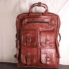 https://leather.burnermedia.in/wp-content/uploads/2024/10/Seven-pocket-brick-brown-leather-backpack.webp